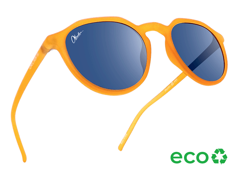 Okulars Eco Pacific Amber Blue sunglasses with recycled amber frame and blue lenses.