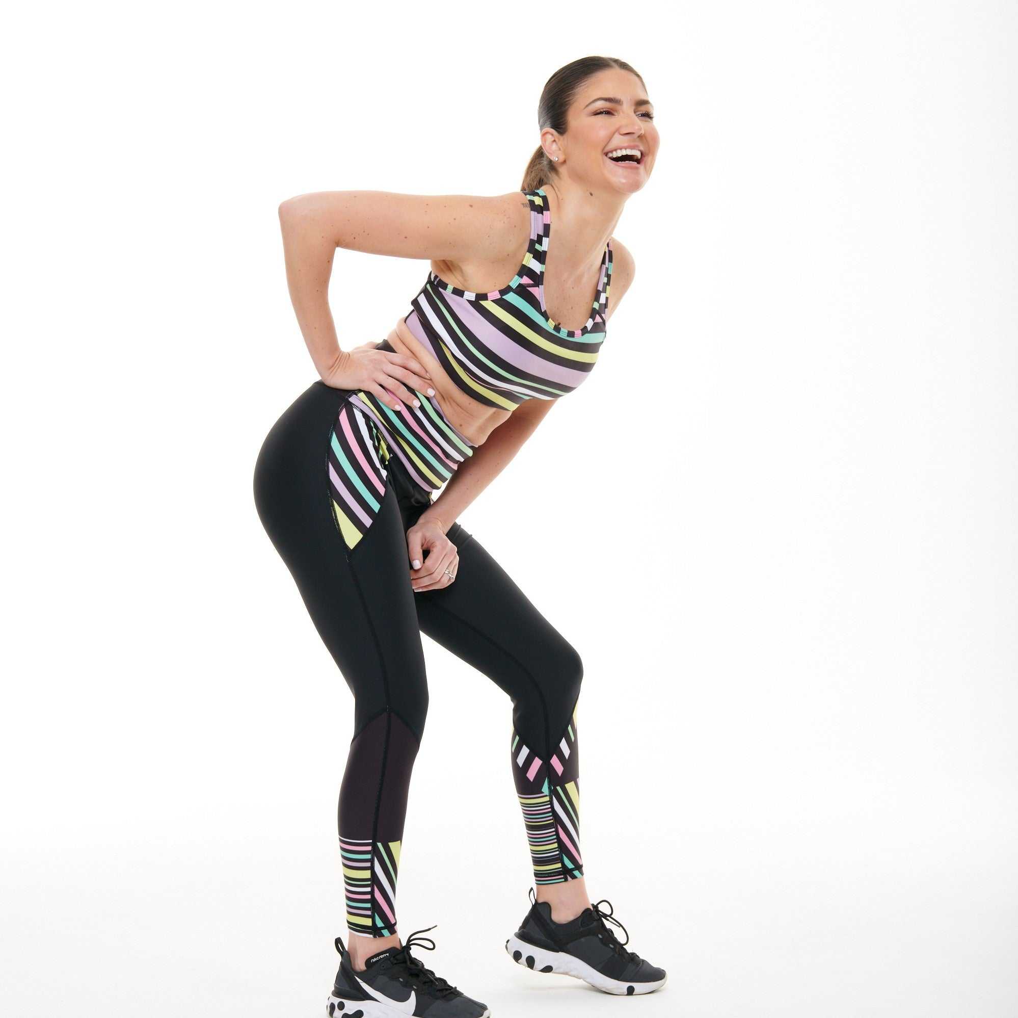 Aso-Oke Pastel Butiful Leggings with contemporary design and engineered waistband, featuring a vibrant Aso-Oke pattern.