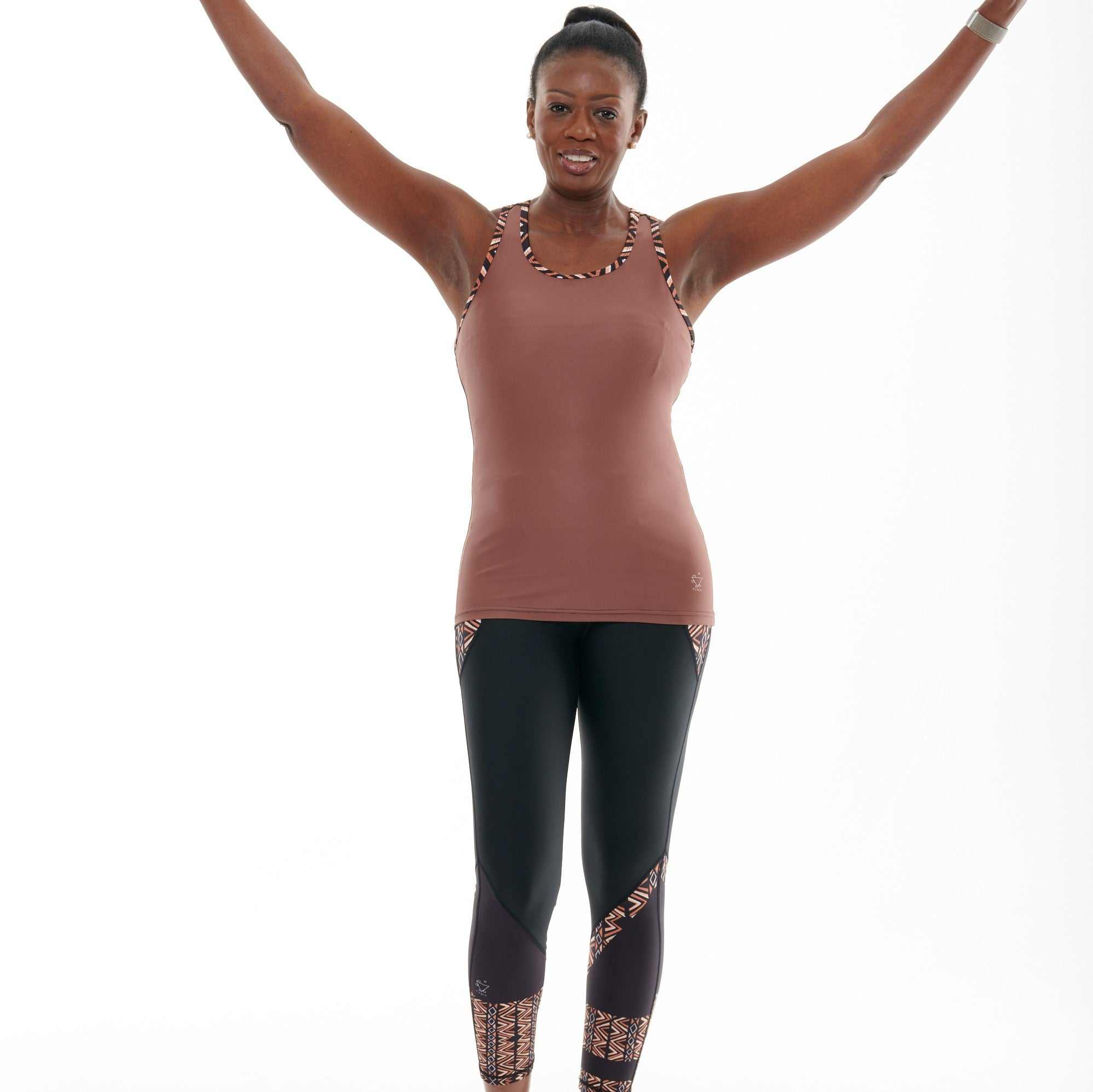 Slim fit Ibeekay Muscle V vest for yoga and workouts, brown with orange, black, and white accents.