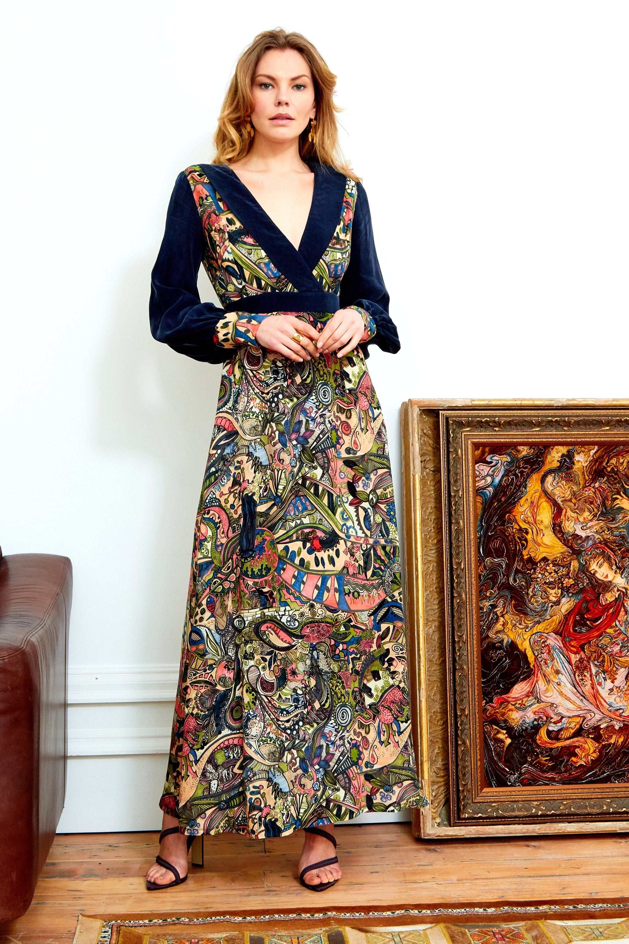 Eco-friendly printed long sleeve maxi dress with artistic hand-drawn design, V-neckline, and puffed sleeves.