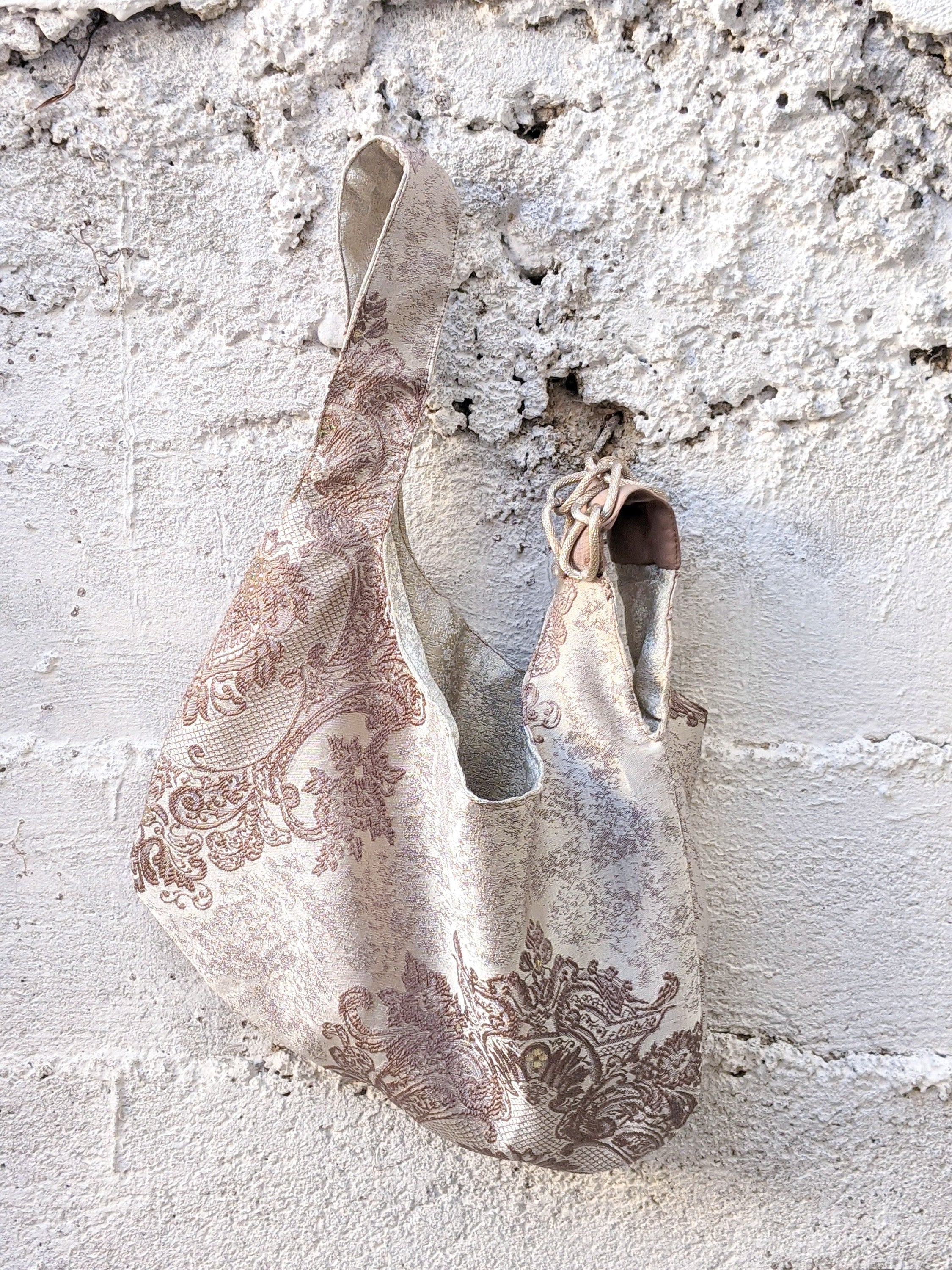 Reversible garment wristlet bag