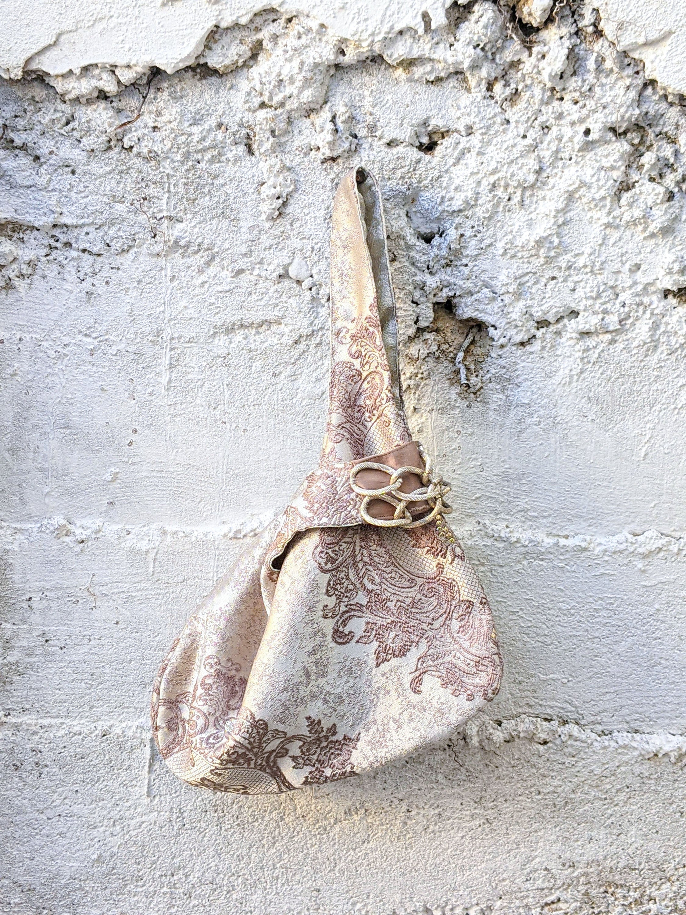 Reversible garment wristlet bag