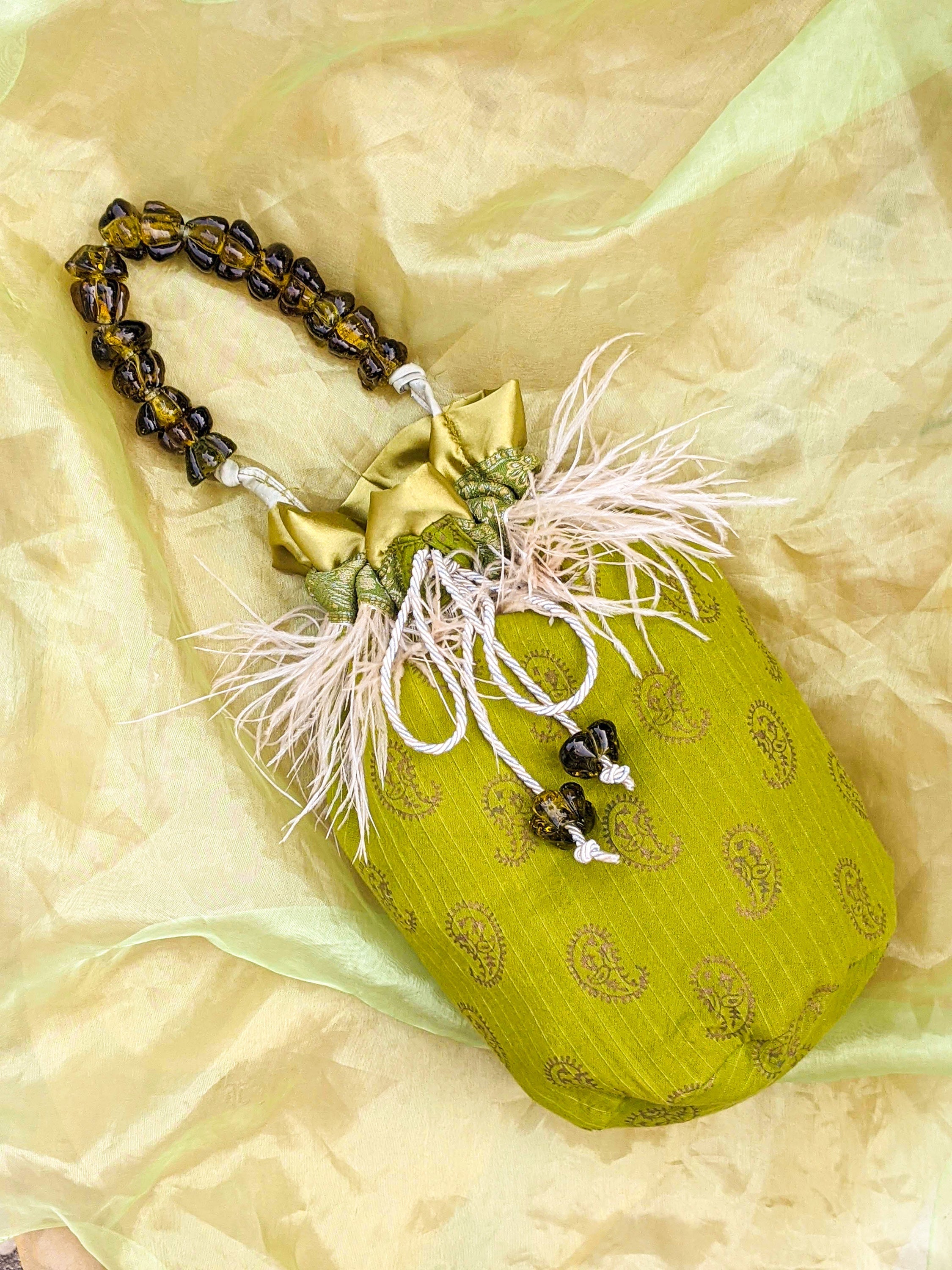Silk pouch bag with glass beads and fringes