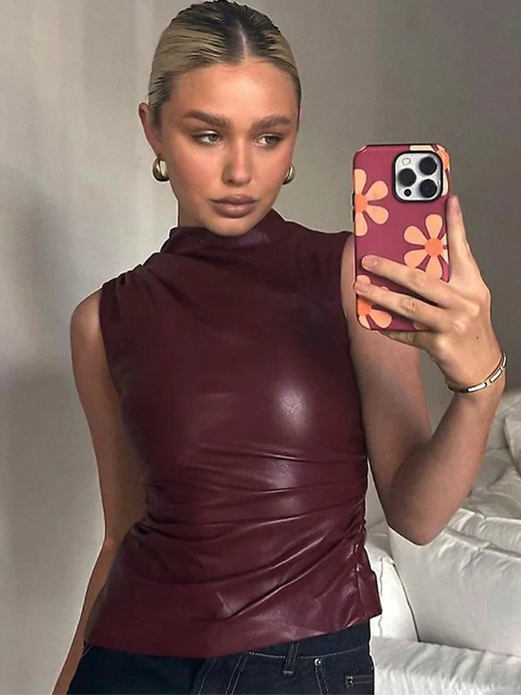 Women wearing a vintage Y2K PU tank top with high waist design.
