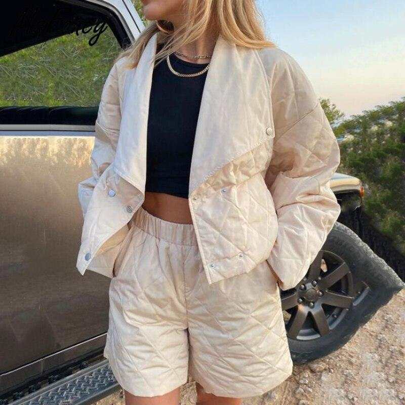 Quilted high waist shorts and crop jacket suit in beige with elastic waist and turn-down collar, ideal for casual winter wear.