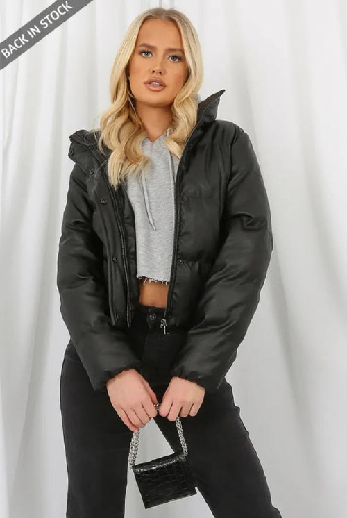 PU Boxy Puffer Jacket in black with high neck, side pockets, and front button closure.