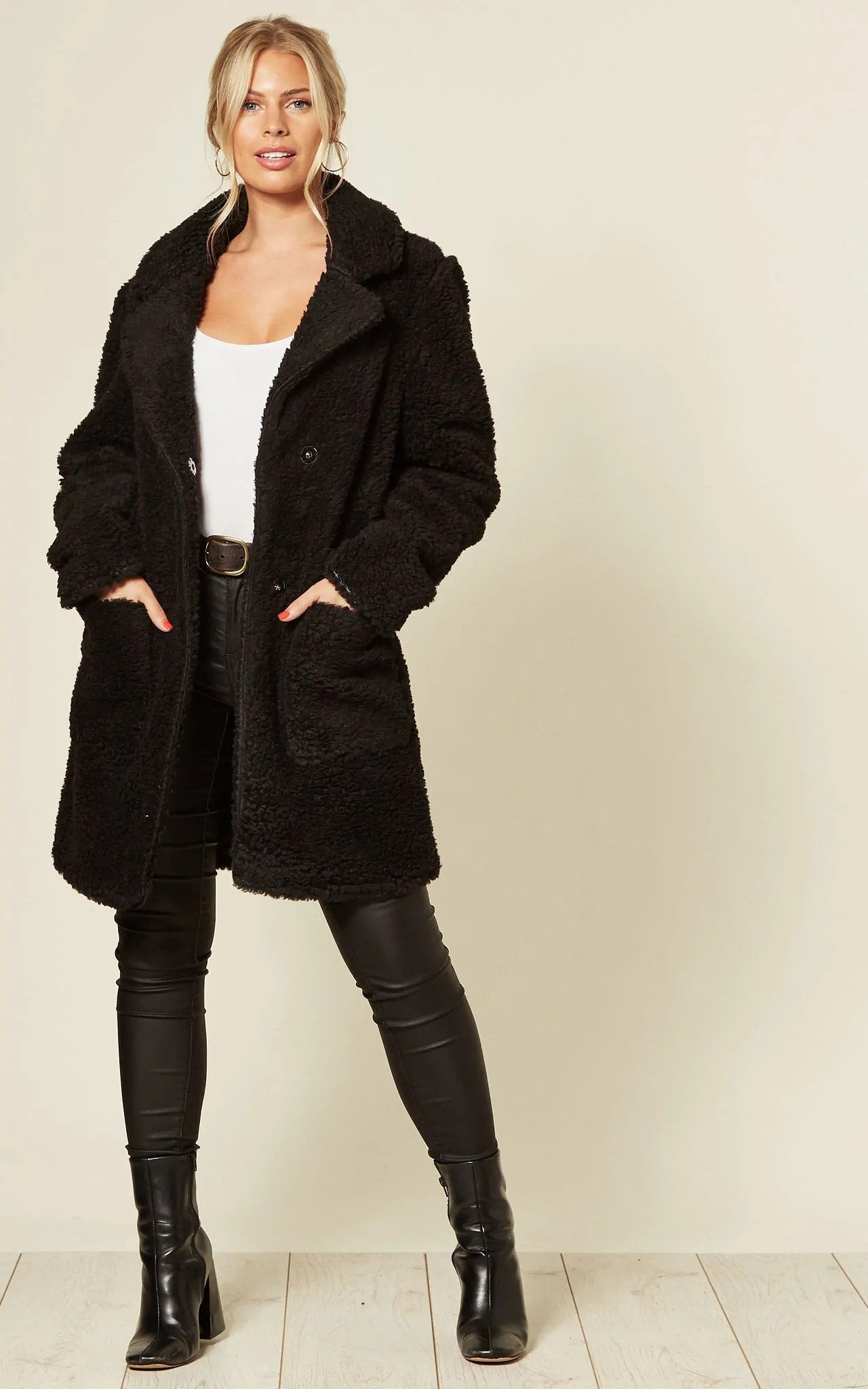 Stud Button Borg Teddy Coat (1905) in black with oversized fit and popper button fastening.