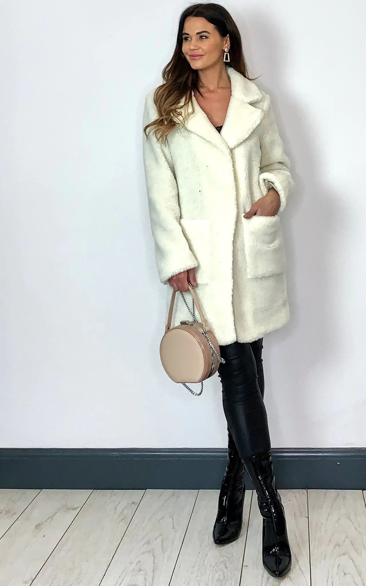 Stud Button Borg Teddy Coat (1905) in white with oversized fit, hip length, popper button fastening, and side pockets.