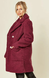 Stud Button Borg Teddy Coat in burgundy with oversized fit and popper buttons, hip length.