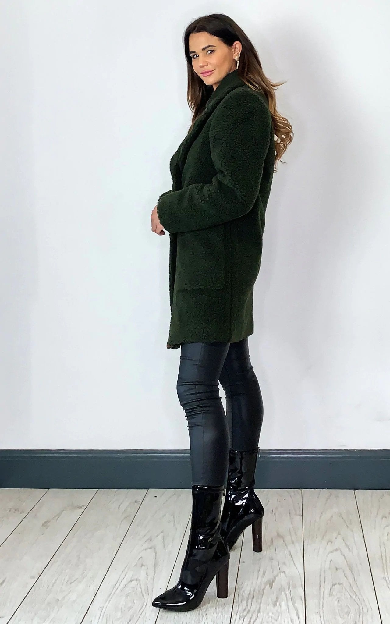 Oversized stud button borg teddy coat (1905) in dark green with popper button fastening and side pockets.