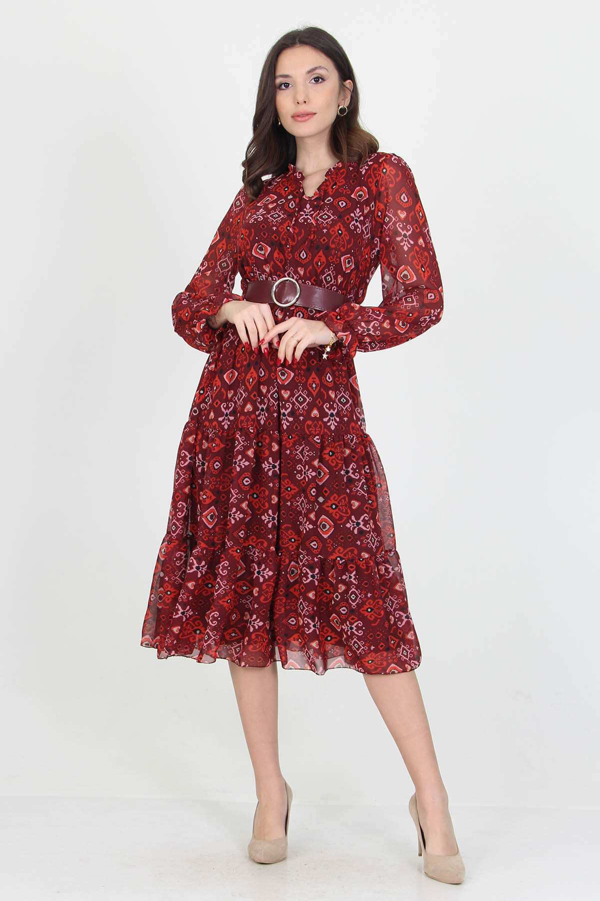 Patterned chiffon dress with long sleeves and self-tie belt.