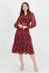 Patterned chiffon dress with long sleeves and self-tie belt.