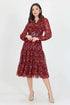 Patterned chiffon dress with long sleeves and self-tie belt.