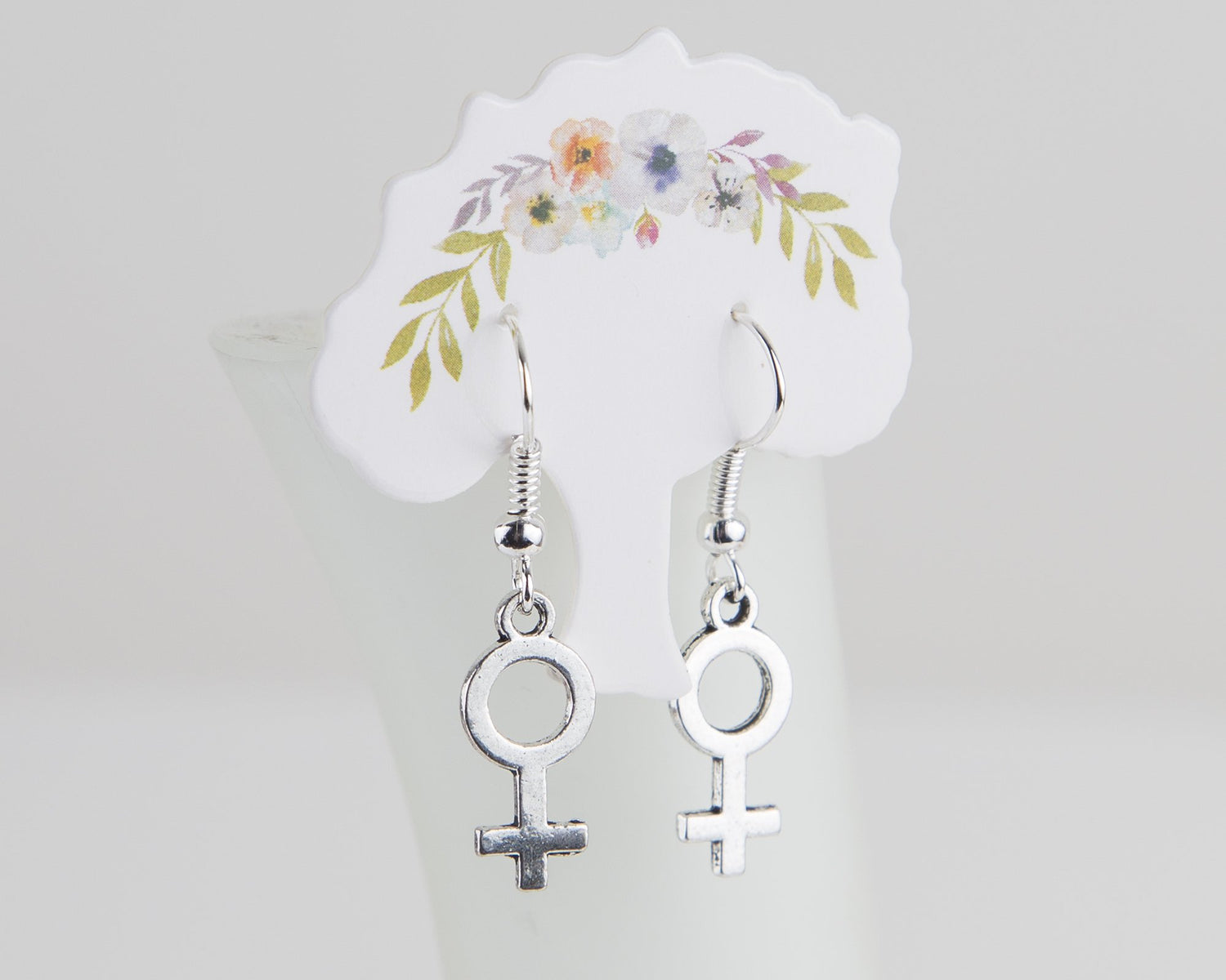 Female symbol earrings