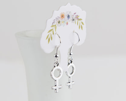 Female symbol earrings