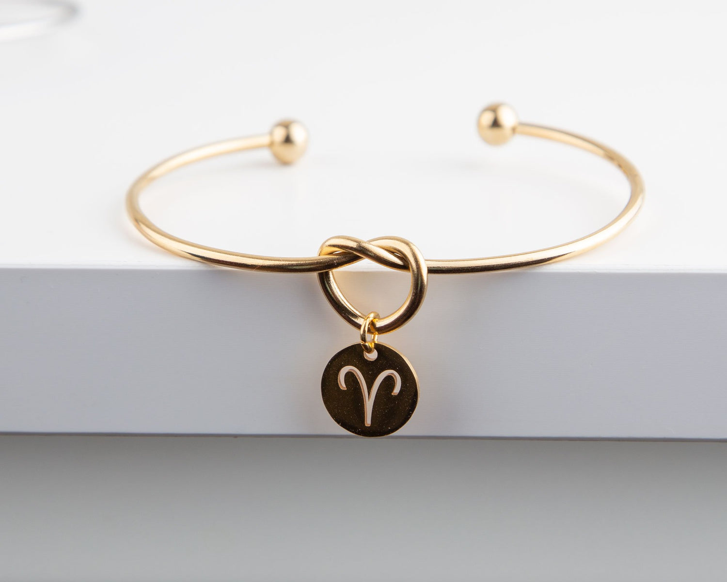 Dainty Knot Bracelet, Gold Plated Wire Knot Bangle with Zodiac Symbol