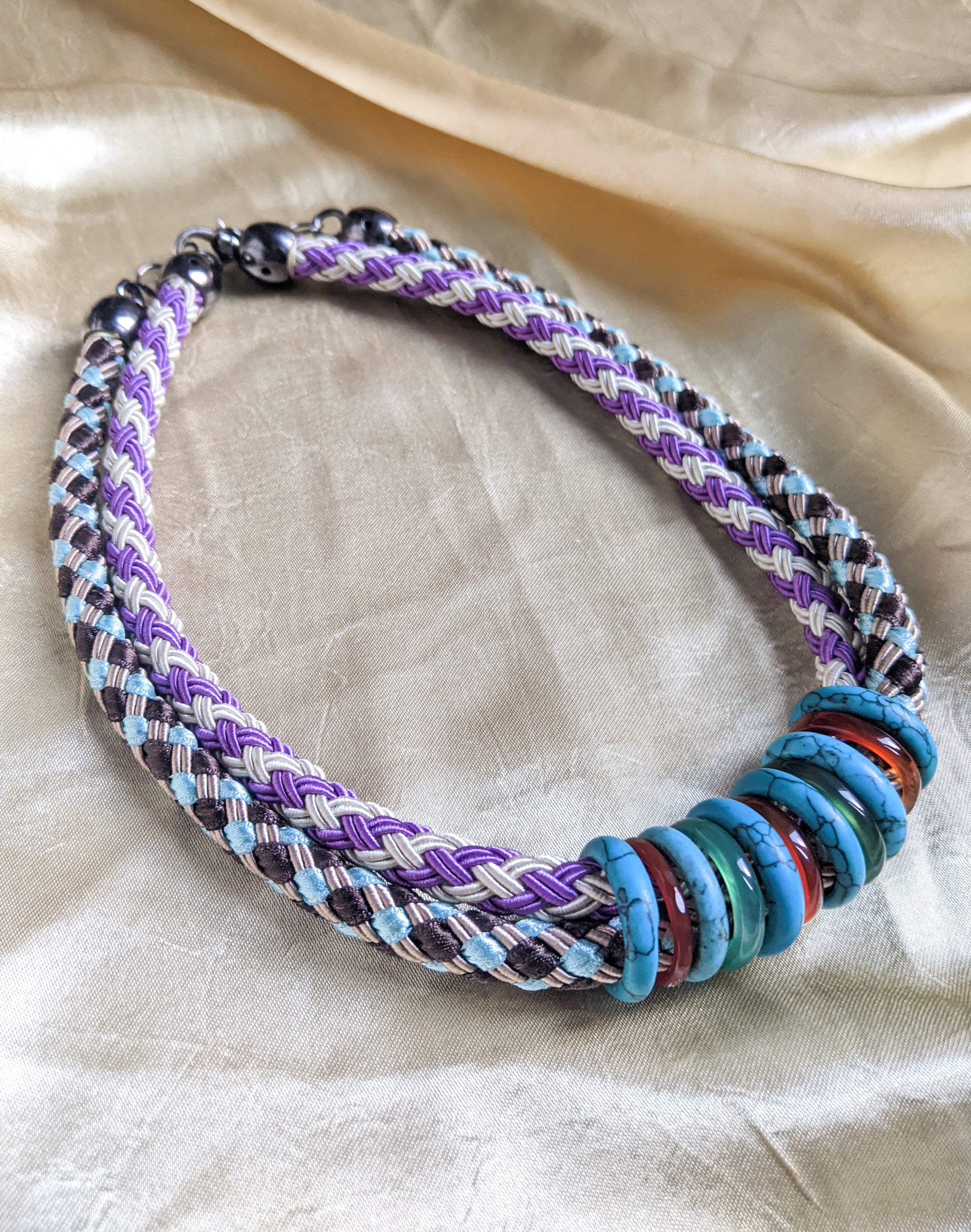 Knit rope choker with colorful rings